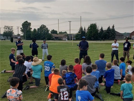 Lomas Brown meets Macomb Mustangs football team